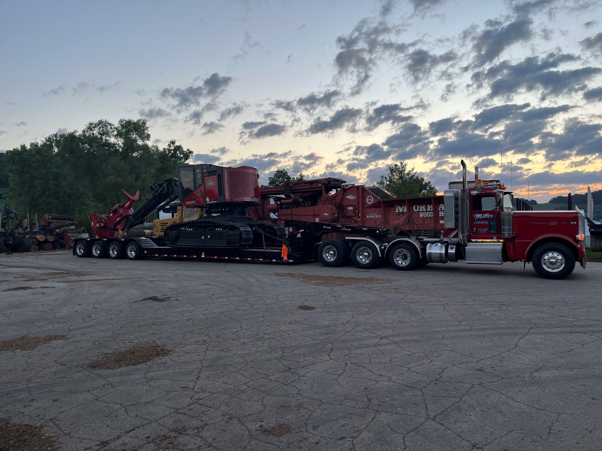 Bill Miller equipment and truck at sunset